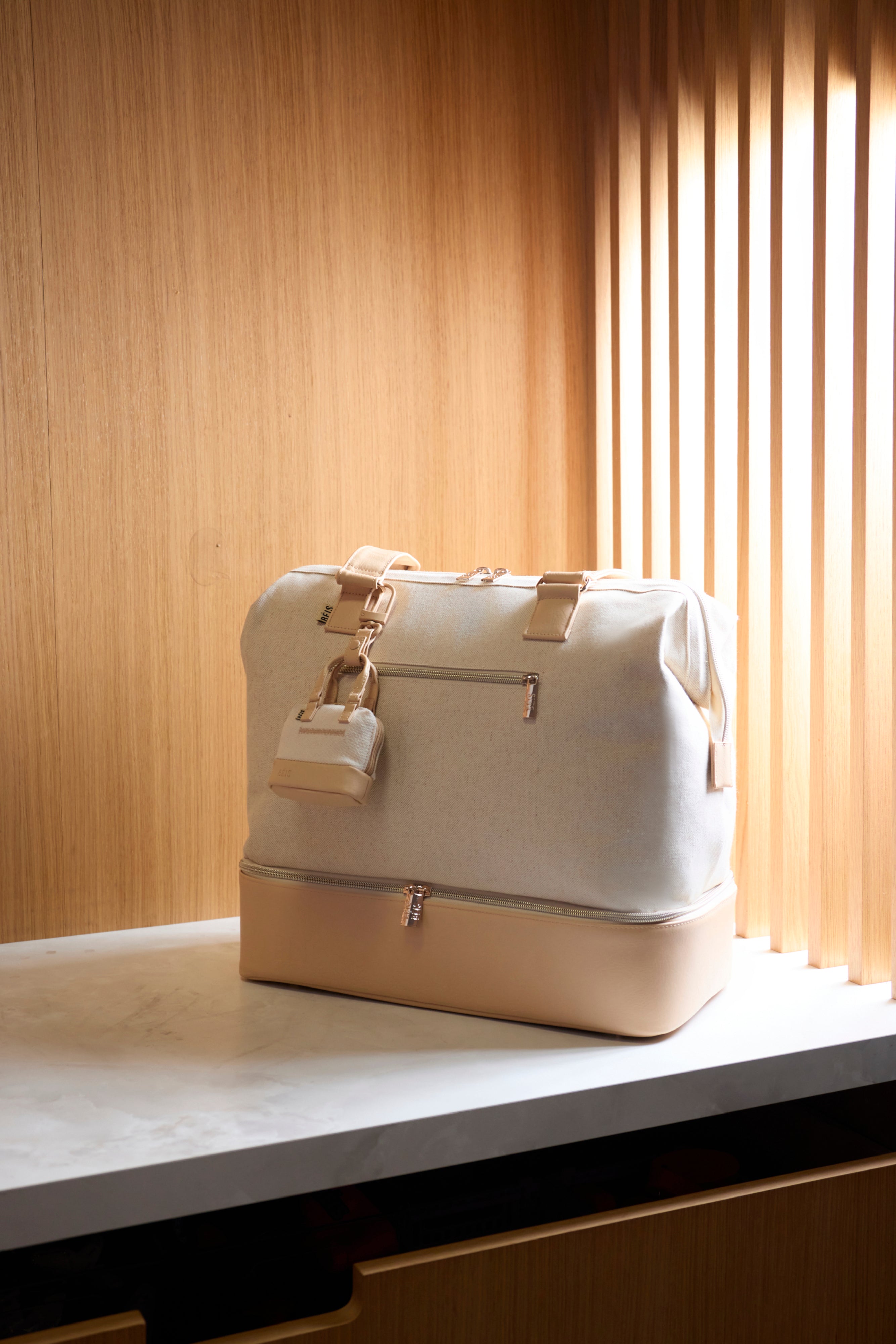 The Micro Weekender Charm in Beige
